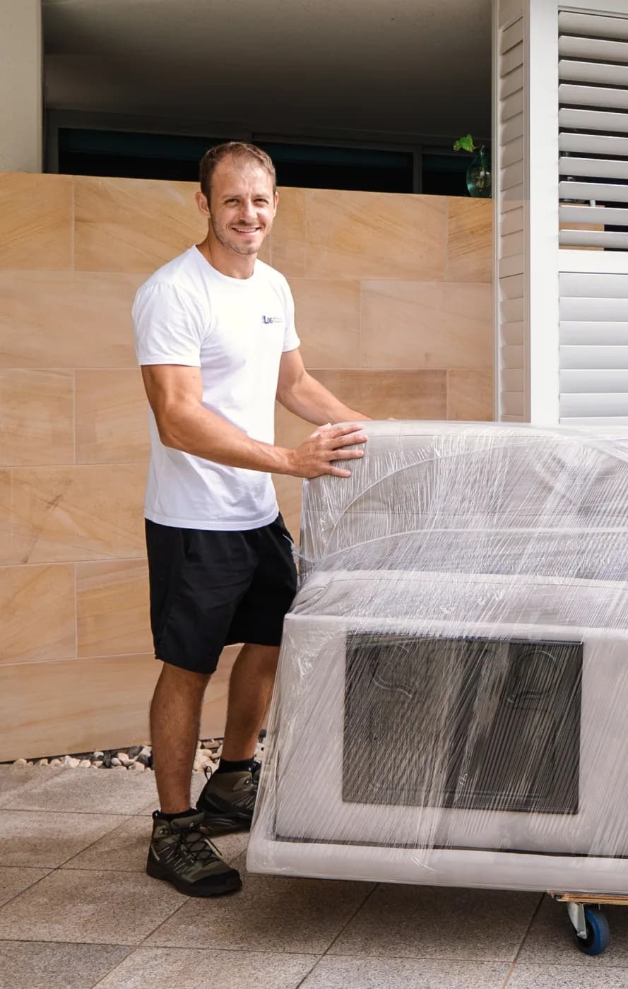 Lucas, founder of LOG Removal & Transport, on the job