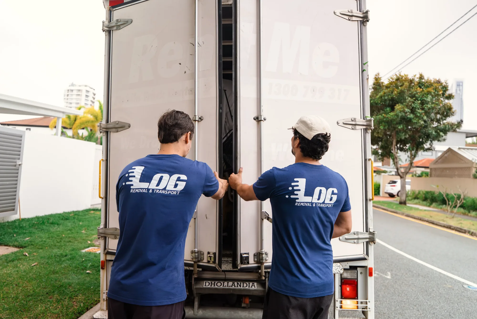 LOG Removal & Transport team beside the removal truck