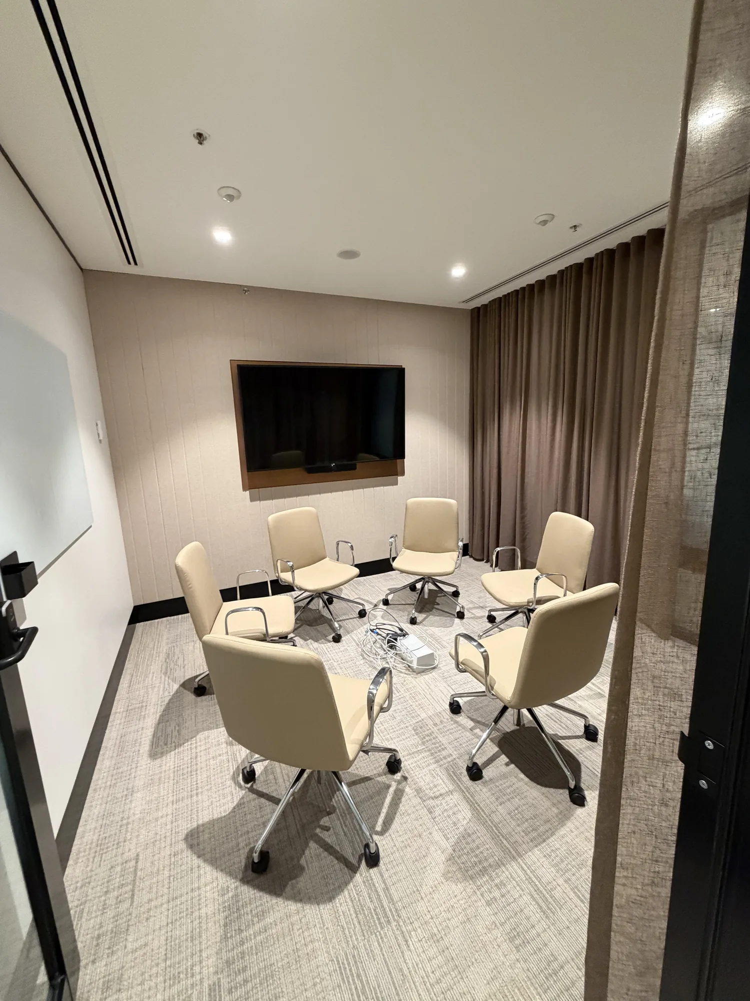 Meeting-room chairs set out by LOG Transport in a relocated office