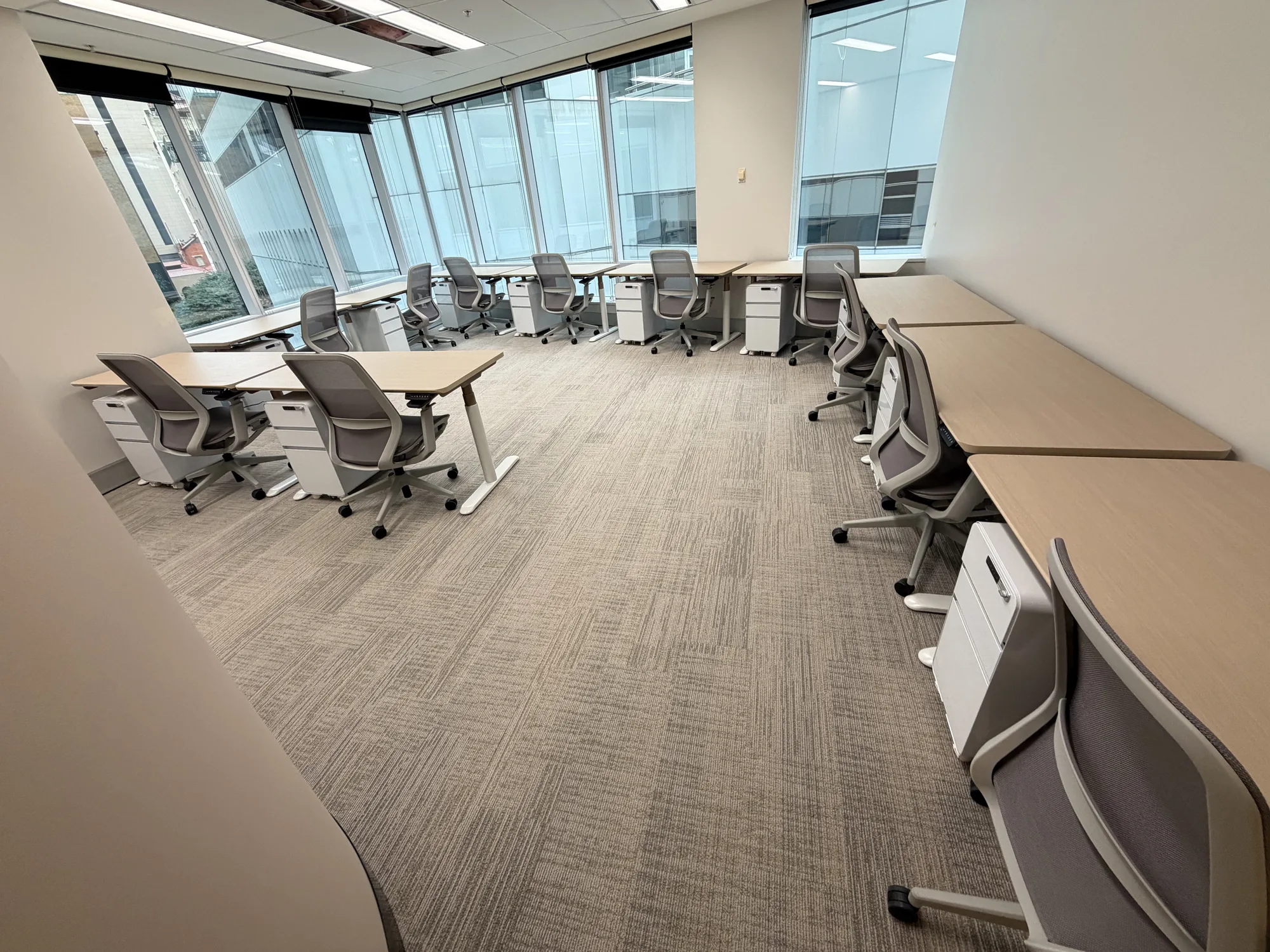 Rows of office desks relocated and set up in a CBD tower by LOG Transport
